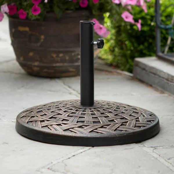 Walker Edison Furniture Company Cross Weave Round Metal Patio Umbrella Base in Antique Bronze