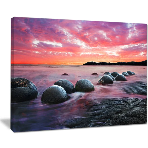 Design Art PT9480-32-16 Moeraki Boulders at Sunset Seashore Photo Canvas Art Print - Red, 32x16x22