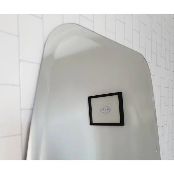 Decor Wonderland Sydney Mini 22 in. x 28 in. Oval Beveled Frameless Bathroom Vanity Mirror with Dual Mounting Brackets - Silver