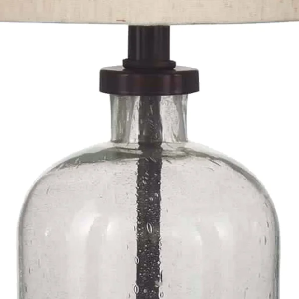 Benjara Cylindrical Seeded Glass Table Lamp with Fabric Drum Shade, Beige and Clear